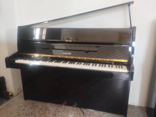 pianoforte sauter tedesco con trasporto e panca inclusi