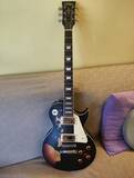 vintage-v100-icone-black-over-sunburst