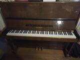 pianoforte-verticale-petrof-noce-lucido